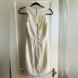 H&M ivory figure dress 
gold buttons 
cutout on back
Fallen hem but easy to sew
